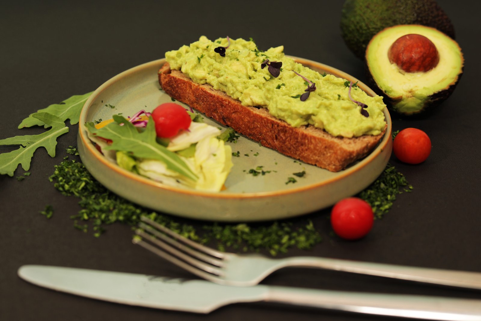 Avocado toast on sourdough with fresh garnish